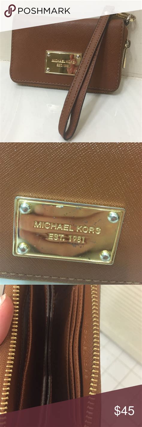 michael kors iphone wristlet uk|Michael Kors clutch.